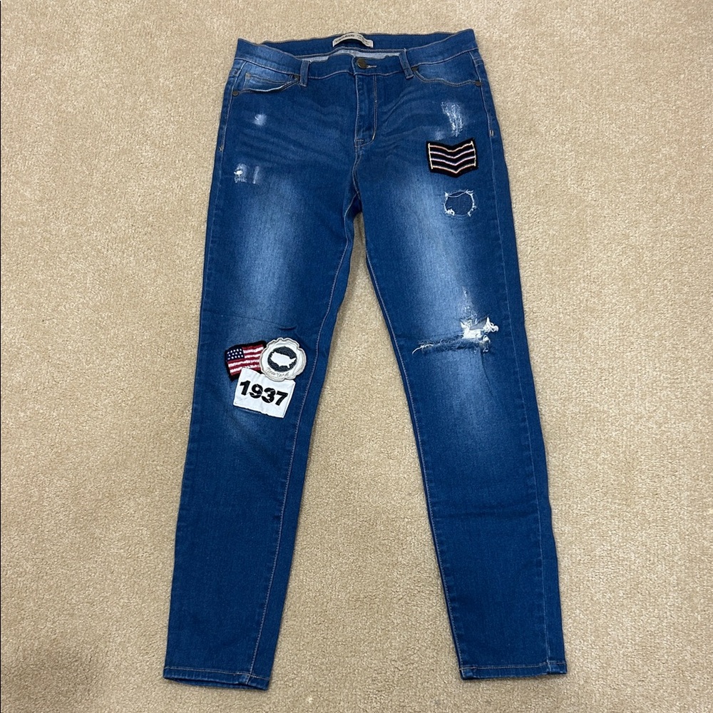 Women’s Blue Distressed Jeans with Patches
